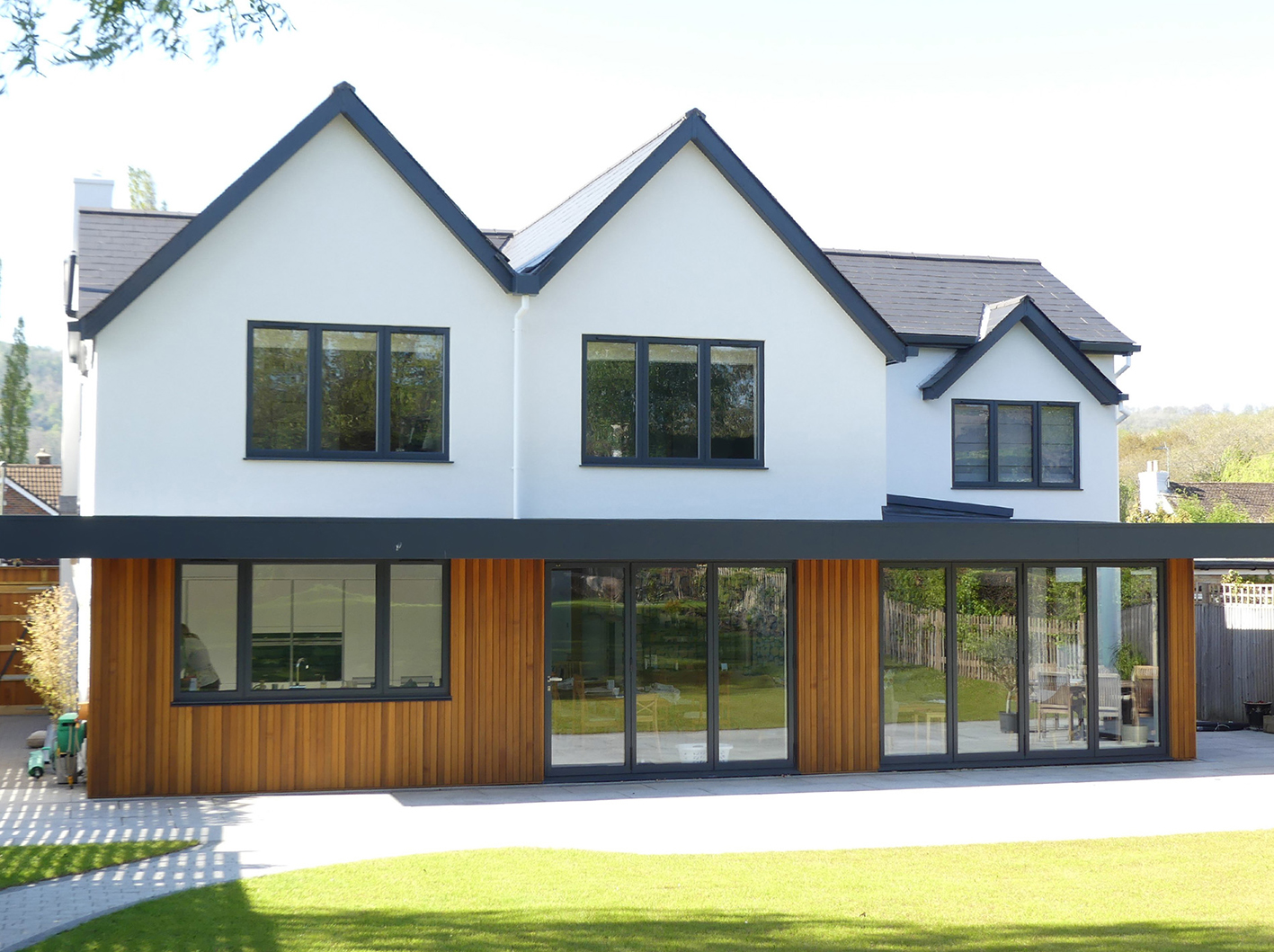 front timber clad houses